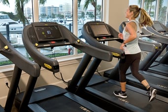 woman jogging on treadmill